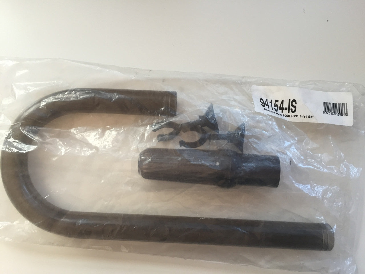 A Plastic inlet tube, strainer and suction cups for a 3000/3000 UVC Canister filter packaged in a clear plastic back