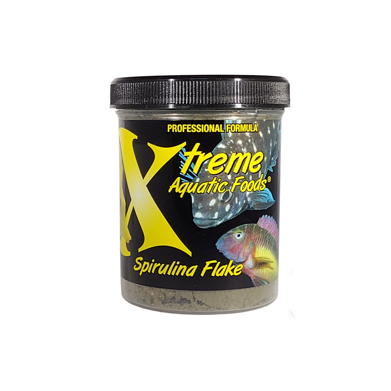 A 14g container of Xtreme brand Spirulina flake aquatic fish food with bright, colourful fish on the lavel.