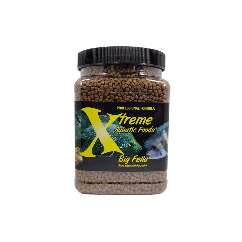 A clear container of Xtreme 567g Big Fella 3mm Pellet fish food, showing the product name and description, alongside a label showing various fish and the size of the food pellets.