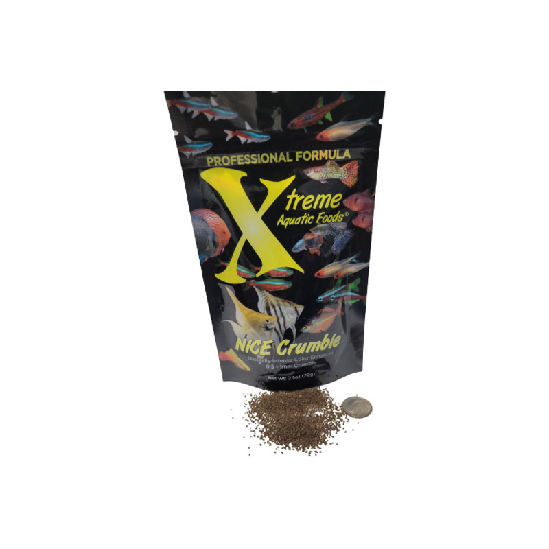 A black bag of Xtreme 70g NICE Crumble fish food, showing the product name and description, alongside a label showing various fish and the size of the food pellets next to a coin.